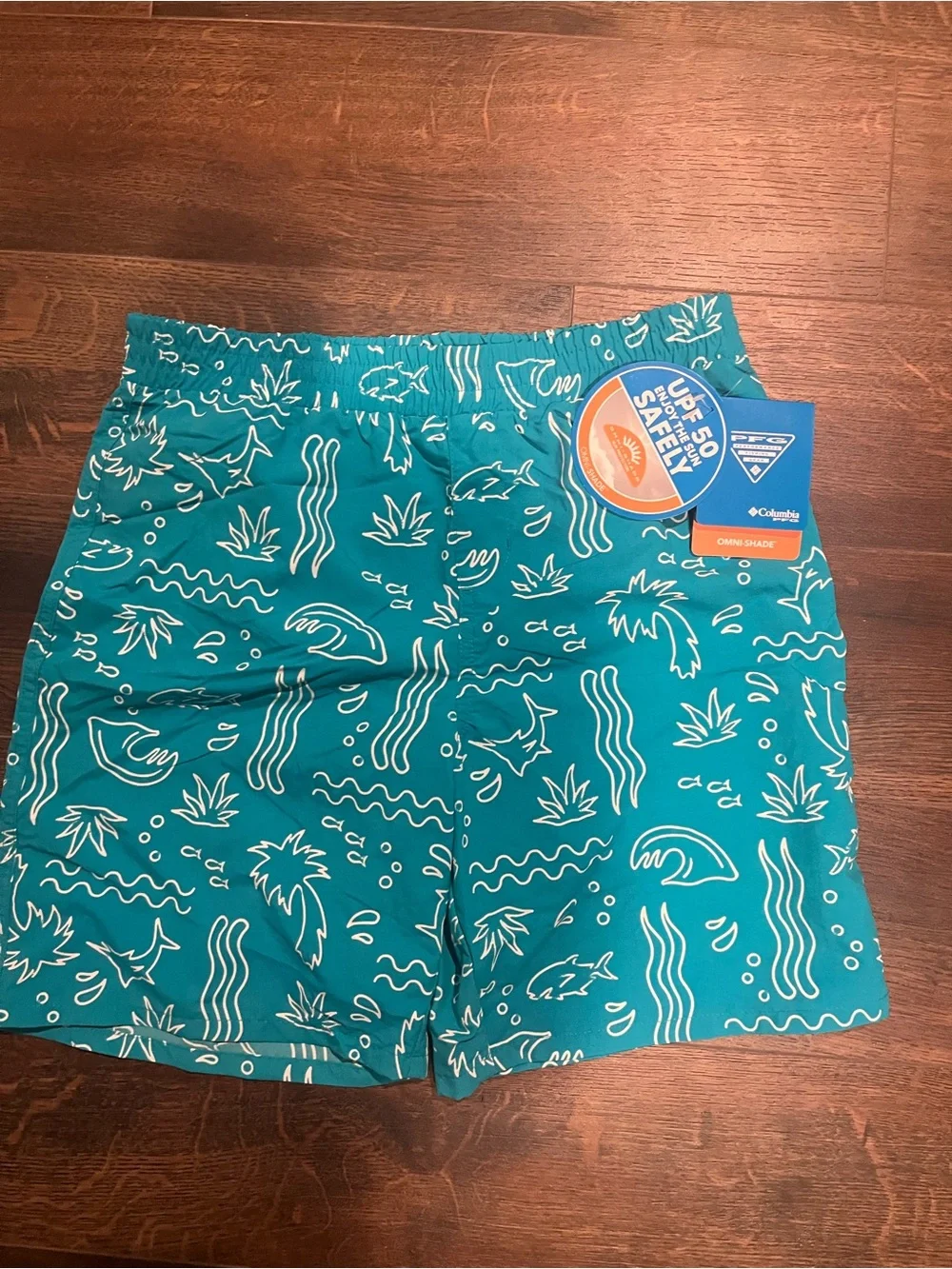 Columbia Teal Swim Trunks with White Tropical Motif